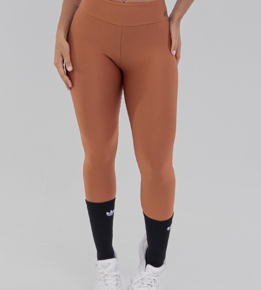 Calça legging Chevry Terracota Belles Active com cós alto duplo e textura moderna.
