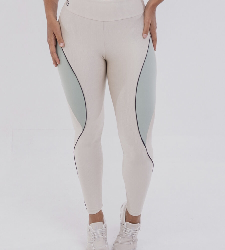 Calça legging bicolor Luna/Aloe da linha Belles Active, com cós alto duplo, modelagem justa e tecido com leve textura.