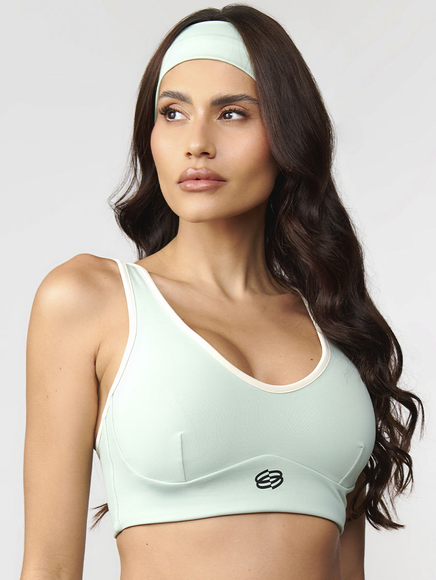 Top camiseta fitness verde aloe com toque gelado média sustentação UV50+ Belles