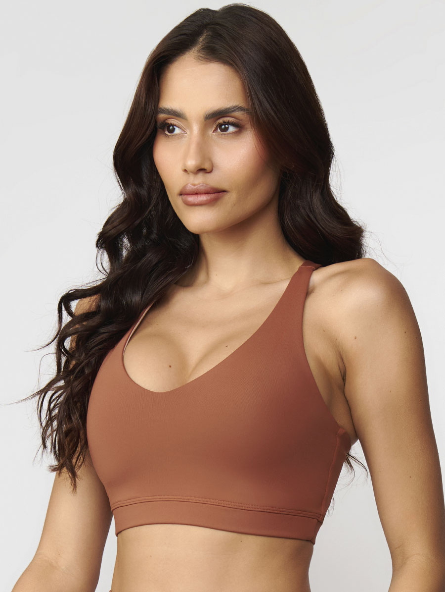 Top fitness terracota com alças cruzadas toque gelado alta sustentação média compressão UV50+ Belles